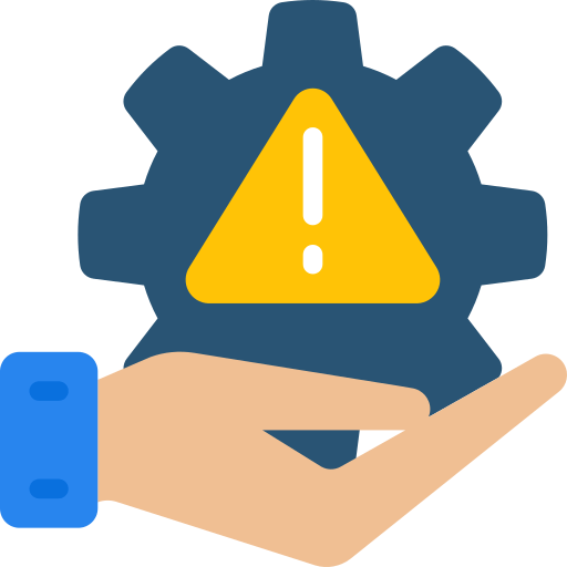 Hand holding a warning sign